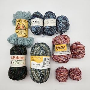 Assortment of mostly wool sock yarn and some corn yarn.